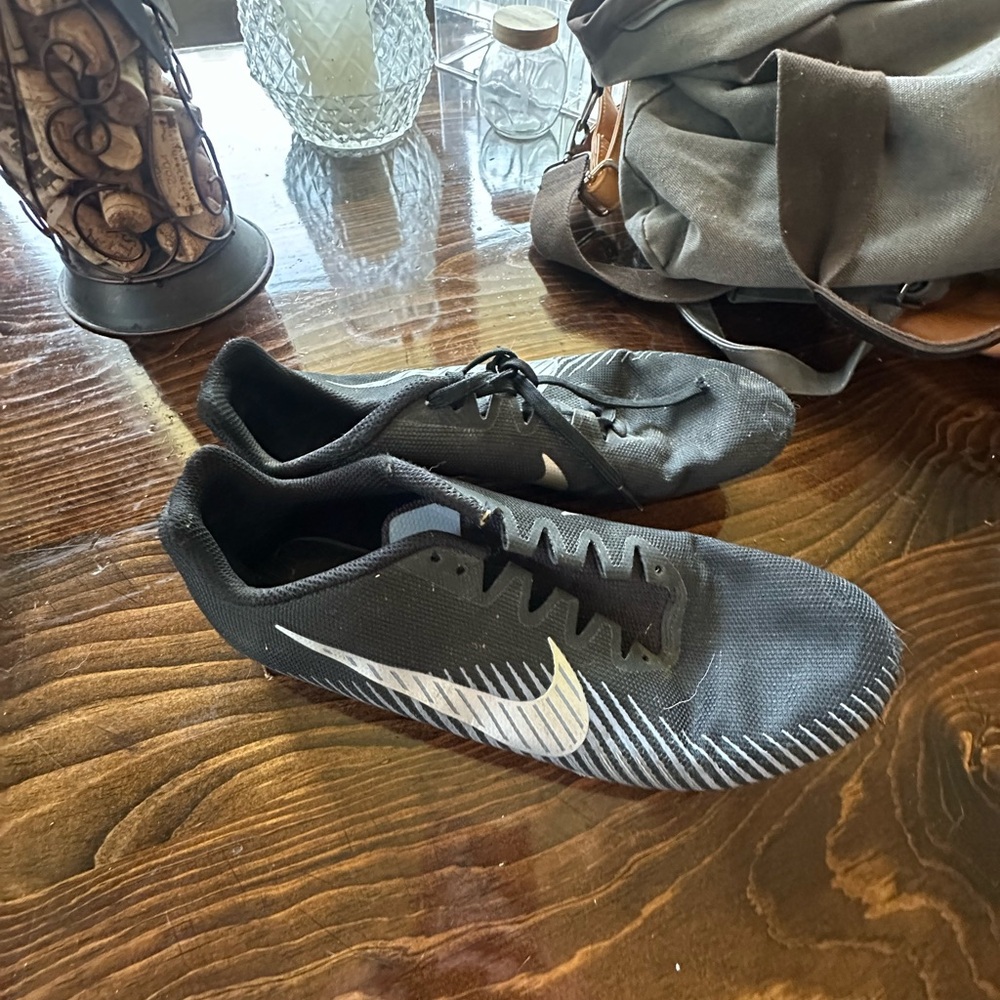 Nike Black and White Athletic Cleats with Ribbed Design